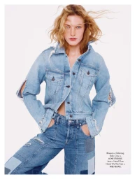 Model in distressed denim jacket and patchwork jeans against a seamless white background for Elle France editorial.
