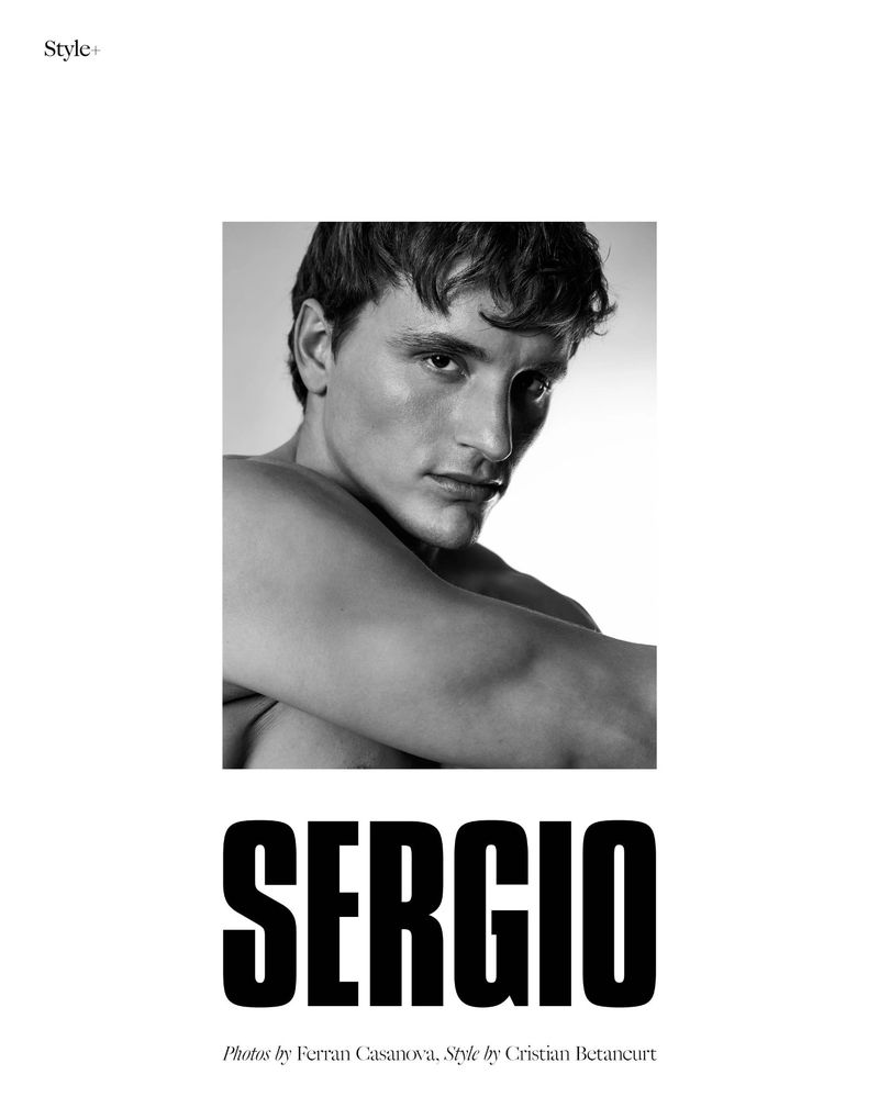 Black and white studio portrait of a bare-chested male model with his arms crossed and the name 'Sergio' in bold text below.