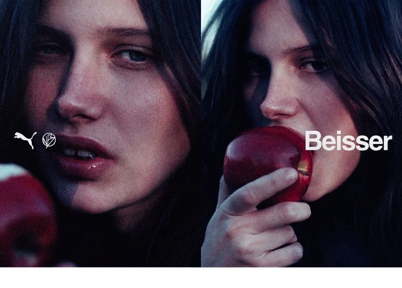 Split screen portrait: A woman bites into a vibrant red apple, set against a dark backdrop, accentuated by Puma and brand logos.