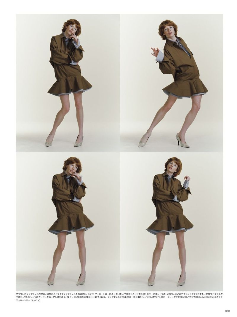 Fashion editorial shot featuring a posing adult woman in a short brown dress and high heels against a light neutral background.