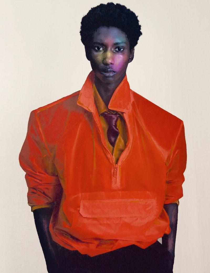 Portrait of an African American man with vibrant rainbow lighting, wearing an orange jacket and tie, in a fashion editorial style shot.