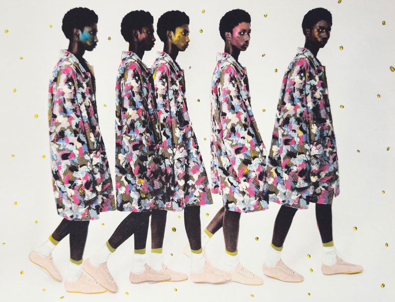 Fashion editorial shot with five young adult women walking in a line wearing matching colorful patterned coats, dark leggings, and light pink shoes.