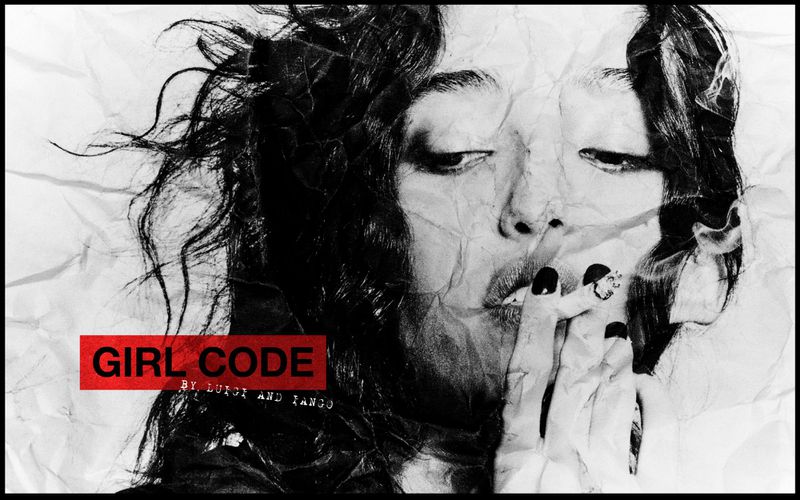 Black and white portrait of model Mona Tougaard smoking a cigarette against a heavily creased paper textured background.
