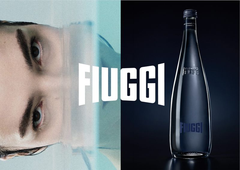 Split composition featuring a close-up of a model's face on the left and a glass water bottle against dark background on the right.