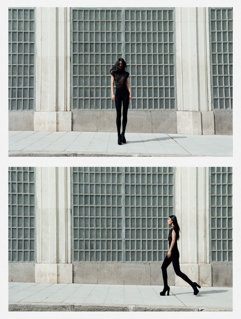Fashion model in dark clothing poses in front of a modern exterior wall with rectangular glass blocks in two vertically stacked shots.
