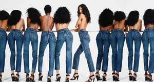 Group of models wearing denim jeans and black high heels against a white background for Alaia Denim 2026 Collection