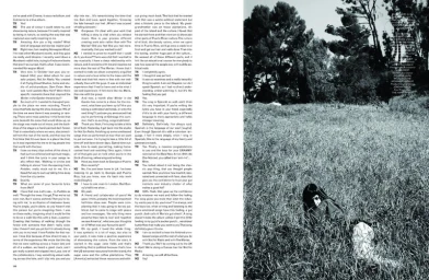 Black and white editorial magazine layout featuring a person lying in tall grass outdoors with trees in the background.