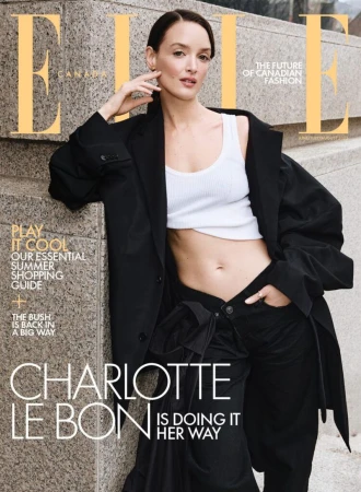 Elle Canada magazine cover featuring Charlotte Le Bon in a black jacket, white crop top, and black pants, posing against a textured wall.