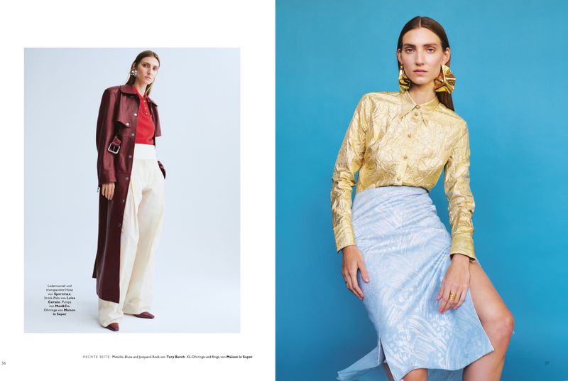 Model Lisa Helene Kramer in a gold blouse and blue skirt against a blue background for Grazia Germany.