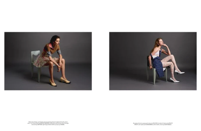 Two models posing on chairs against a grey studio backdrop for a Pop Magazine fashion editorial