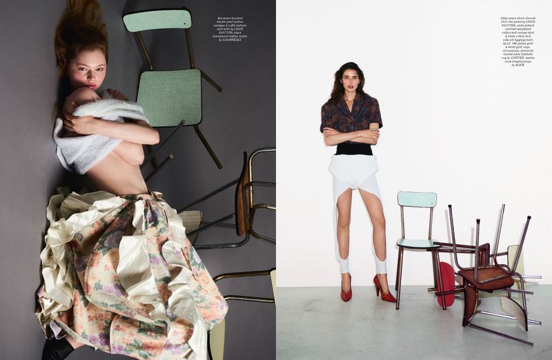 Two fashion models posing among scattered chairs for Pop Magazine editorial photographed by Vito Fernicola