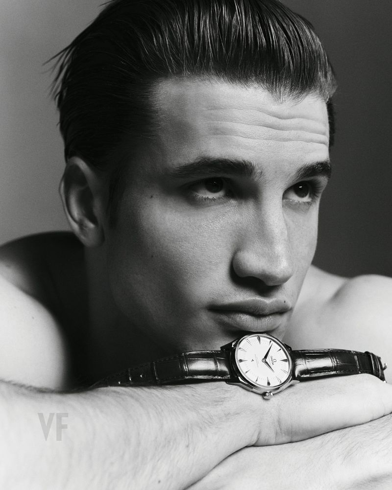 Close-up portrait of model Max Knott wearing a leather wrist watch for Vanity Fair Italia, photographed by Zeb Daemen