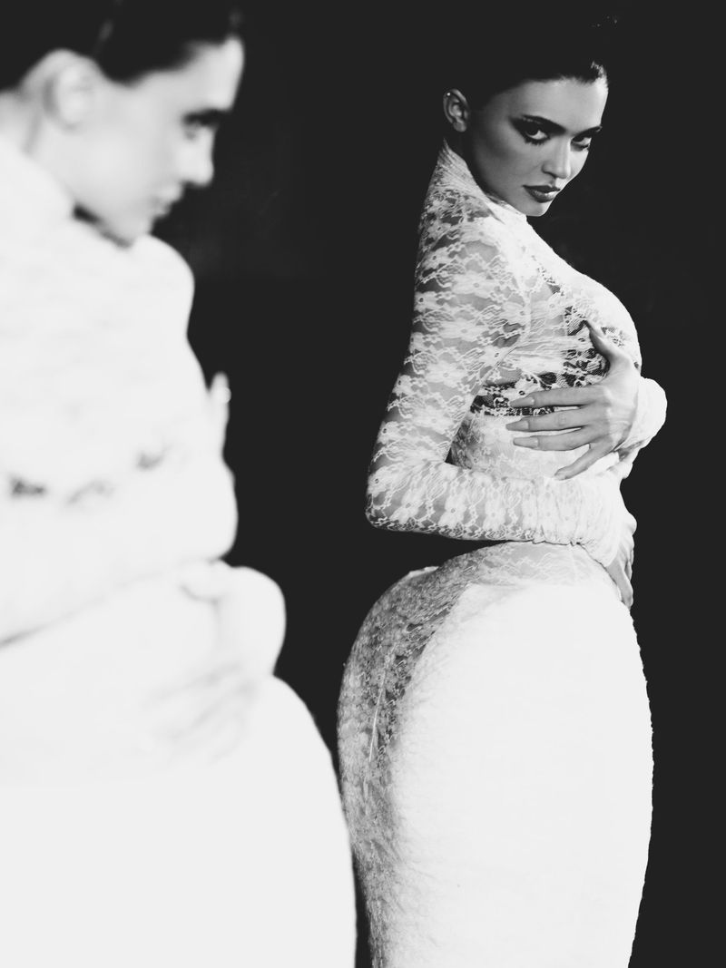 Kylie Jenner wearing white lace dress posing in front of a mirror for Puss Puss Magazine editorial photographed by Kat Irlin