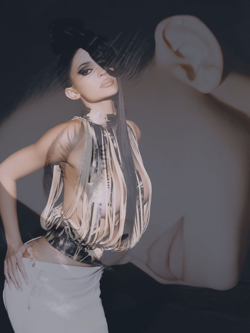 Kylie Jenner in an avant-garde fringe top and white skirt with multiple exposure portrait overlay for Puss Puss Magazine