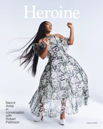 Magazine cover featuring Naomi Ackie in a floral off-the-shoulder gown with long dark hair, against a pale background with magazine title.