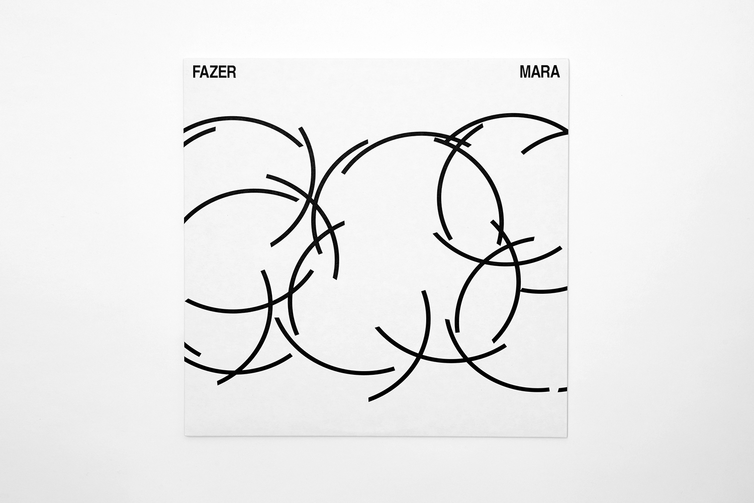 Minimalist album cover design for FAZER featuring black overlapping circular line arcs on a white background