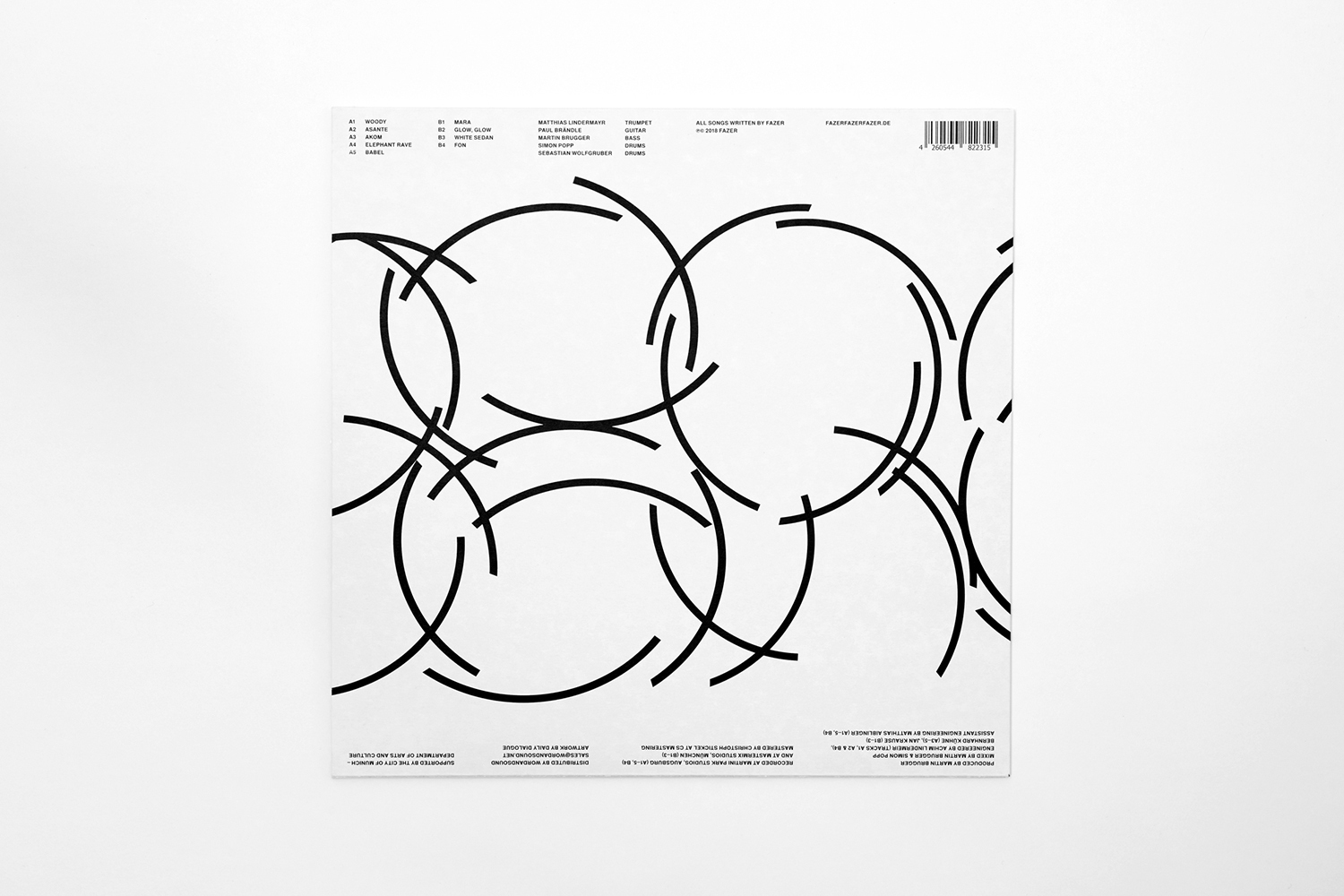 Minimalist black and white graphic design featuring overlapping curved line patterns on a square record sleeve.