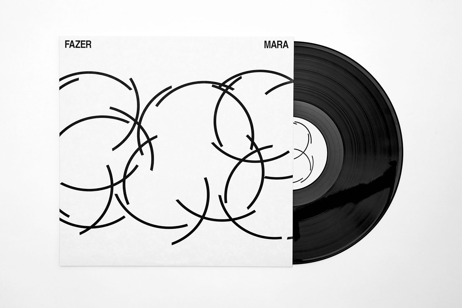 FAZER Mara vinyl record and white jacket featuring minimalist black overlapping curved line graphics.