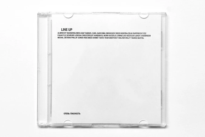 A clear plastic CD jewel case displaying an insert with typography titled LINE UP against a white surface