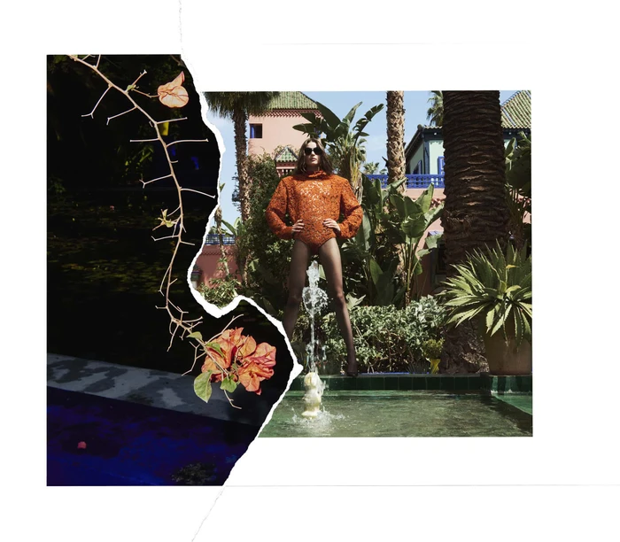 Model wearing orange textured top standing near a garden fountain in Marrakech for Saint Laurent Winter 2025.