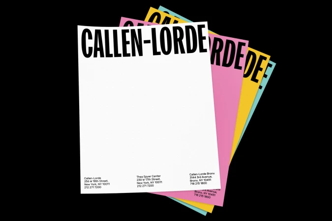 Stacked colorful stationery papers featuring bold black typography for Callen-Lorde brand identity design by Mother Design.