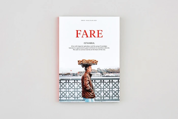 FARE magazine issue cover featuring a man in a brown leather jacket carrying a tray of bread on his head against an Istanbul backdrop.