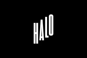 White typography spelling HALO displayed vertically in the center against a solid black background.