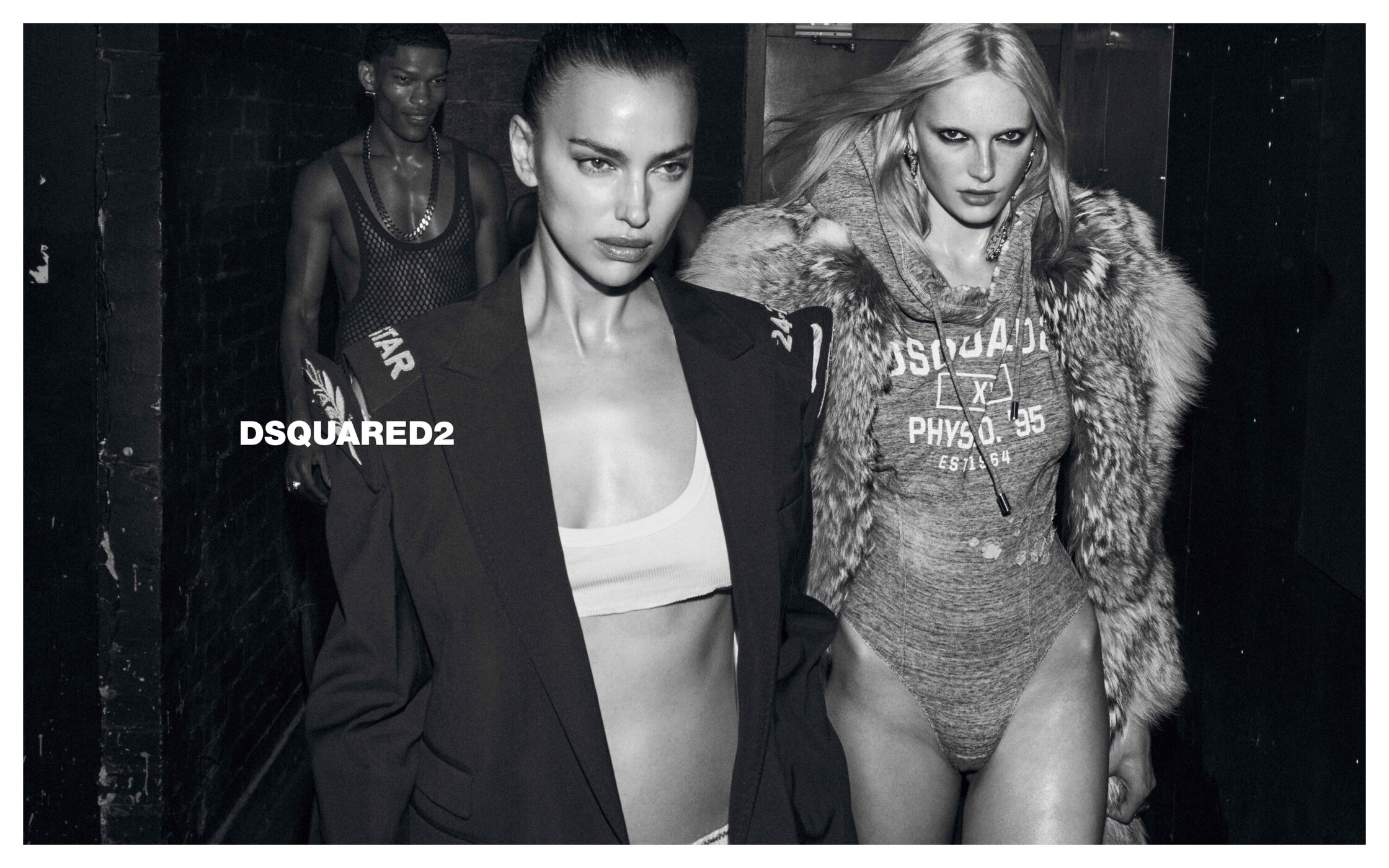 Monochrome fashion advertising campaign image featuring models Irina Shayk and Rylea Beth for Dsquared2 Fall 2025.