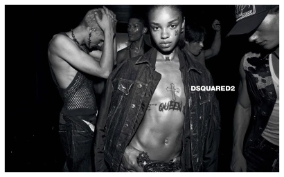 Black and white portrait of multiple models posing in a dimly lit club setting for Dsquared2 Fall 2025 campaign.