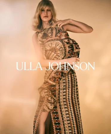 Model with blonde hair wearing a patterned dress against a warm gradient background with the text Ulla Johnson overlaid