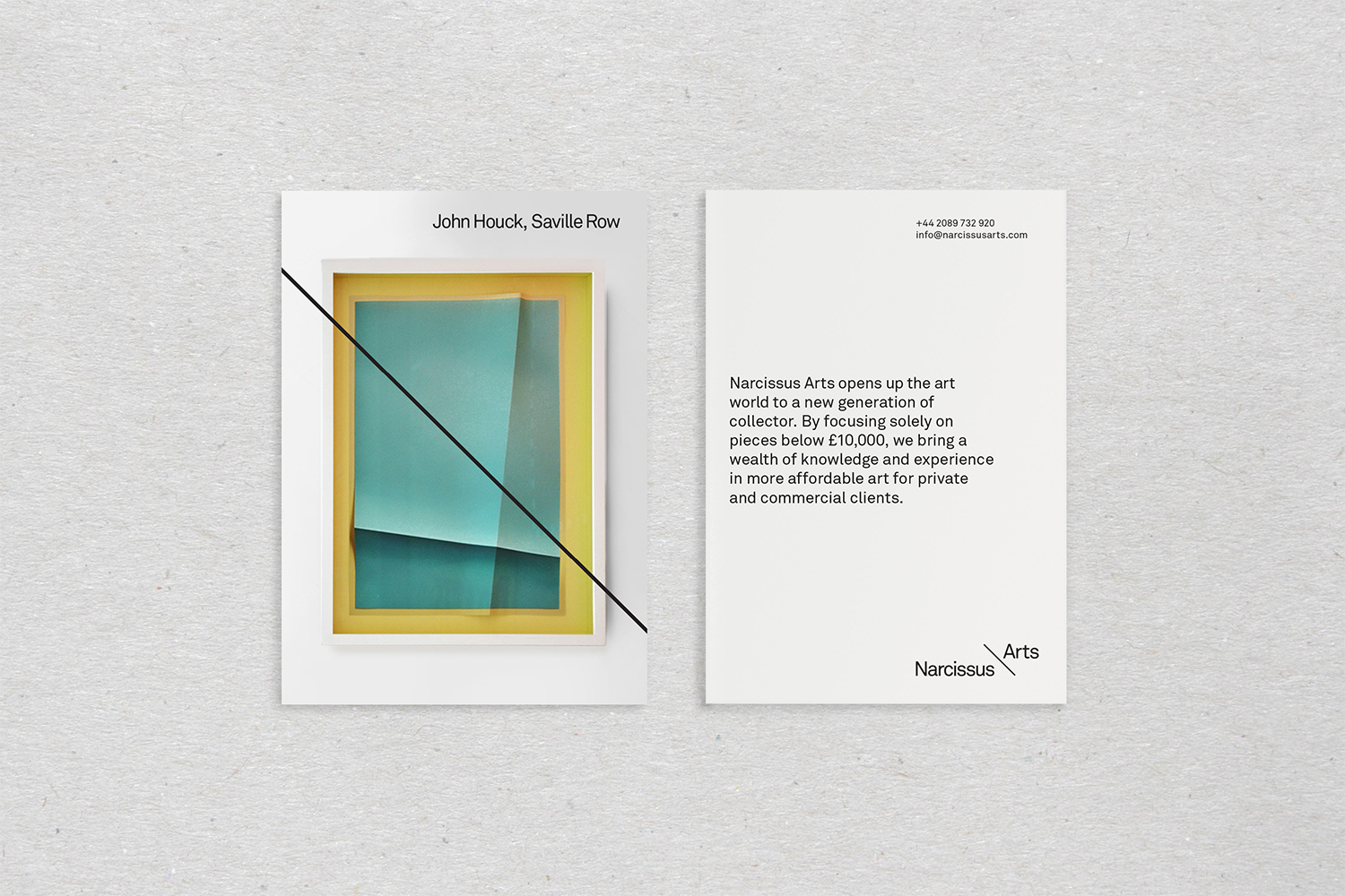 Narcissus Arts brand identity stationery cards featuring minimalist typography and printed artwork on a textured grey background.