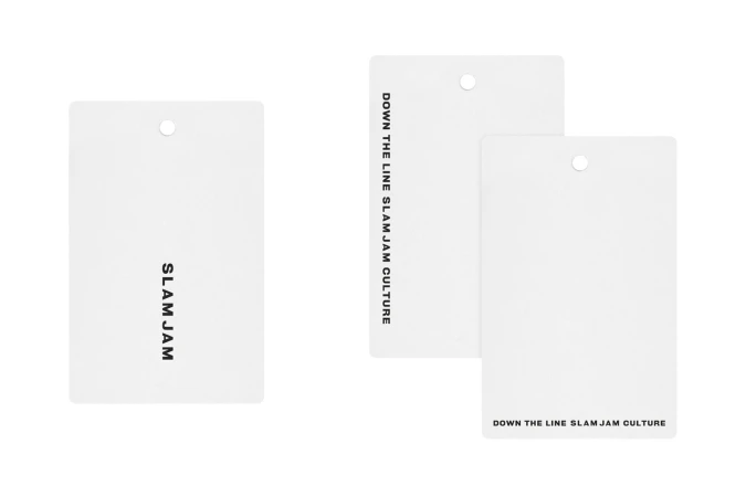 Three white product hangtags featuring black branding text against a clean solid white background