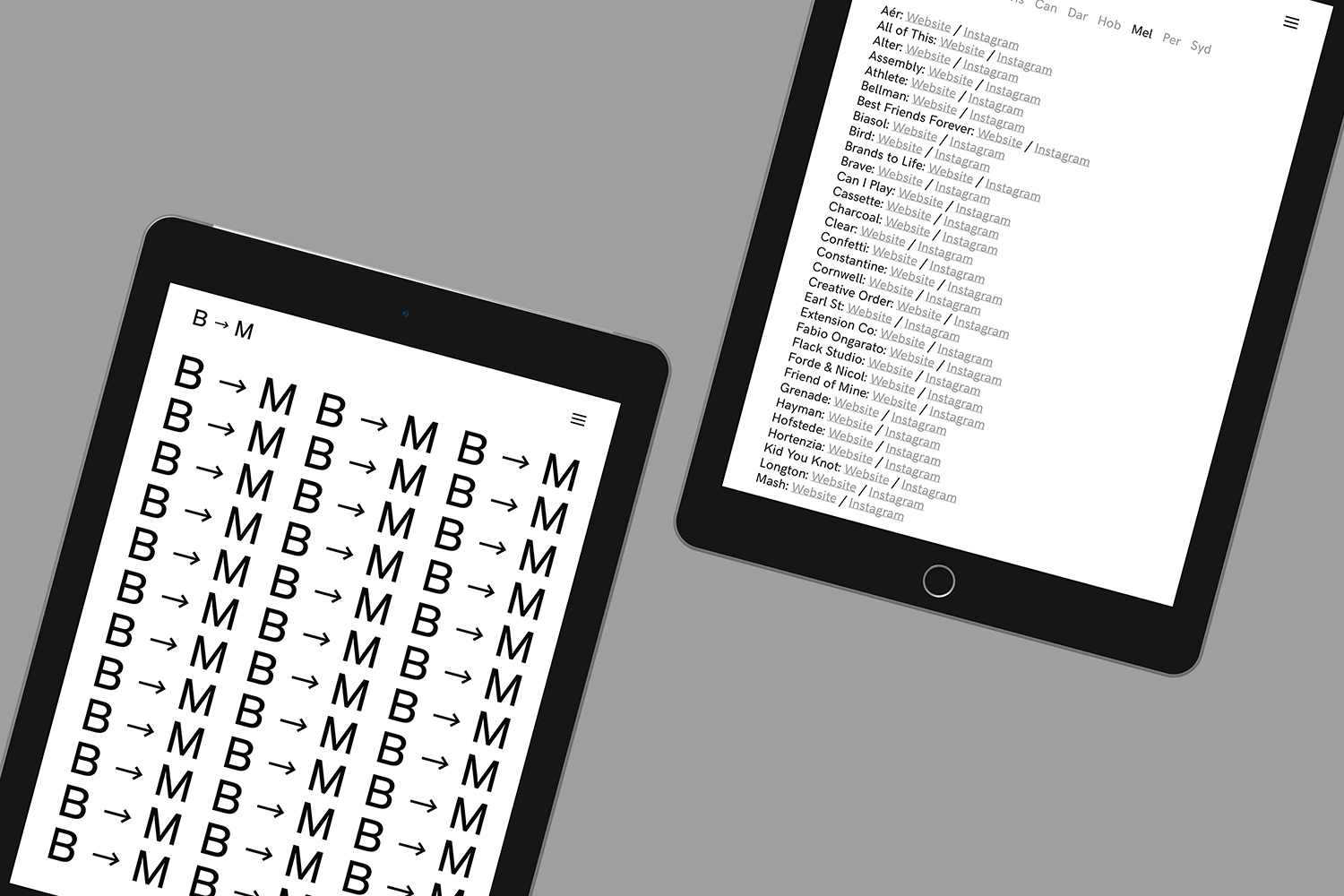 Two black tablets displaying digital brand identity UI designs on a neutral grey background