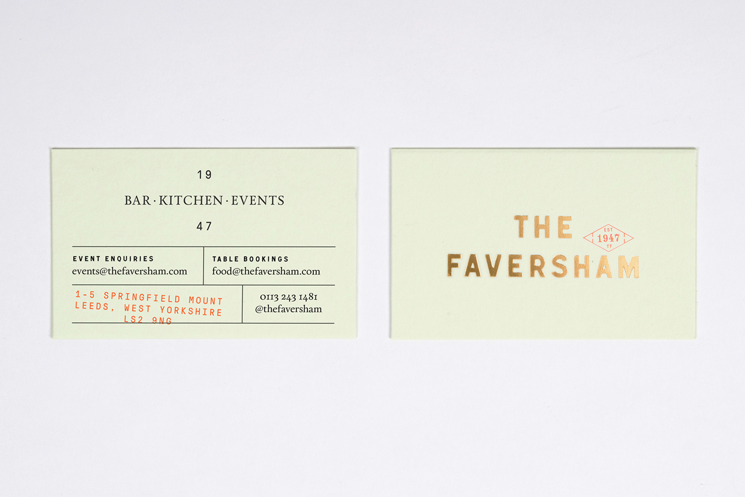 Front and back views of a cream-colored business card featuring gold foil typography and contact details for The Faversham.