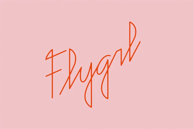Orange cursive typography spelling Flygirl centered on a solid light pink background