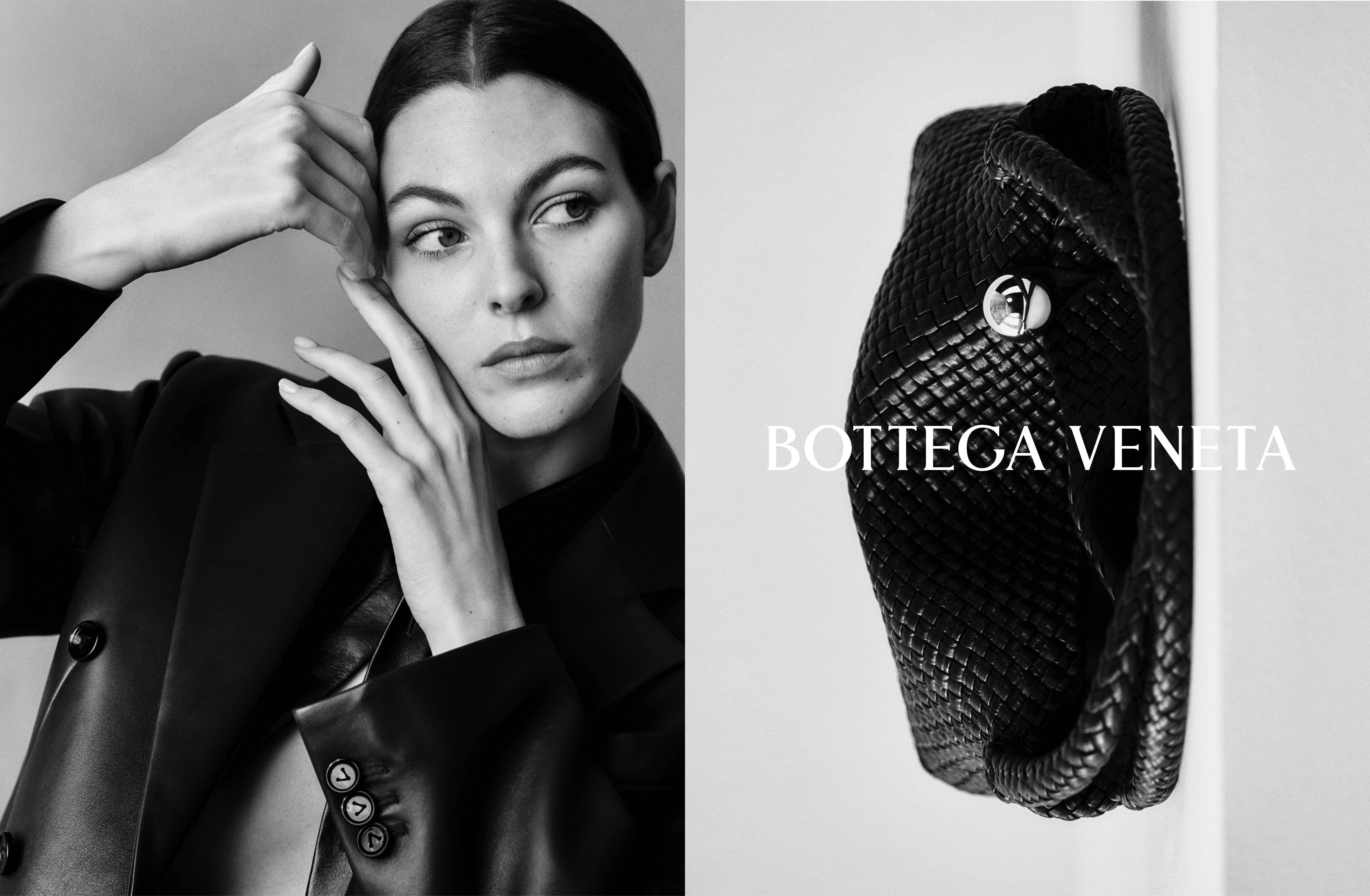 Model in a black leather jacket posing beside a black woven leather bag for Bottega Veneta Campana fall campaign