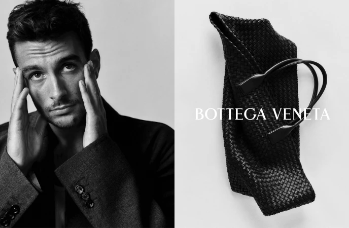 Monochrome ad campaign diptych showing a man posing alongside a black woven leather Bottega Veneta handbag.