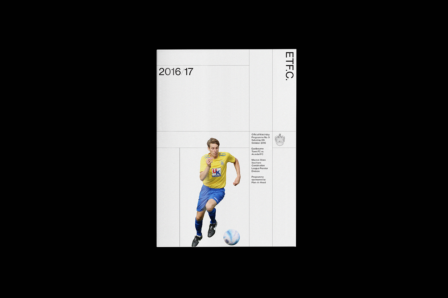 Matchday programme design for Eastbourne Town FC featuring a male footballer running with a football against a white grid background