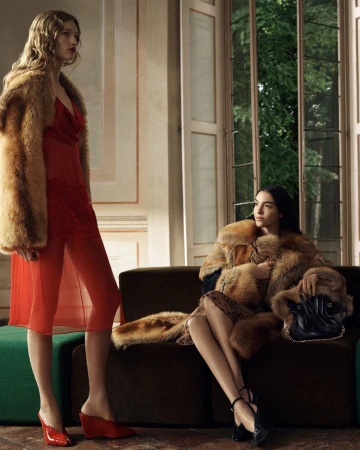 Two models posing in an interior room for the Ferragamo Fall 2025 campaign, photographed by Craig McDean.