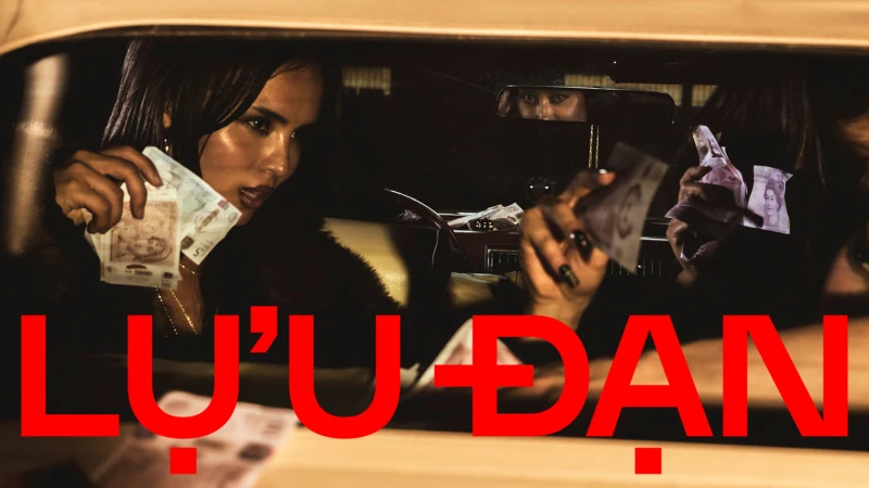 People inside a car holding money in a cinematic campaign shot for Lu'u Dan Fall 2025 by Claryn Chong