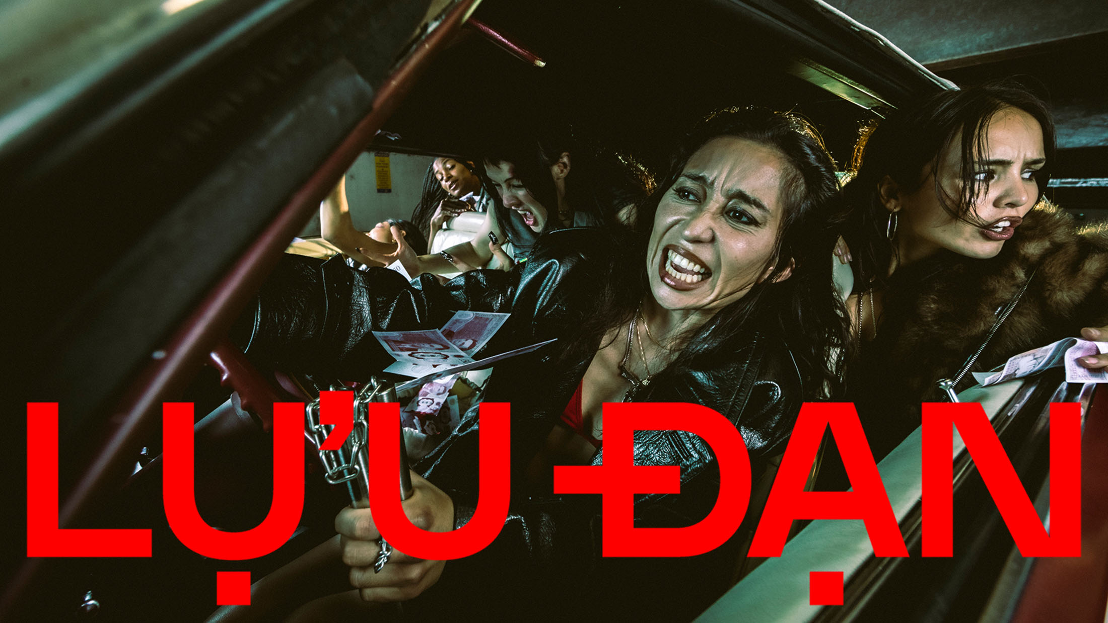 Multiple women screaming inside a crowded car interior for Lu'u Dan campaign