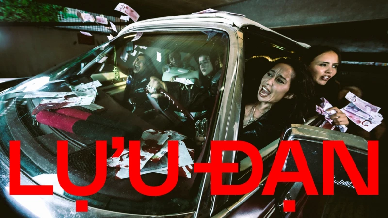 Several people inside and leaning out of a getaway car with banknotes flying while red text reads LU'U DAN