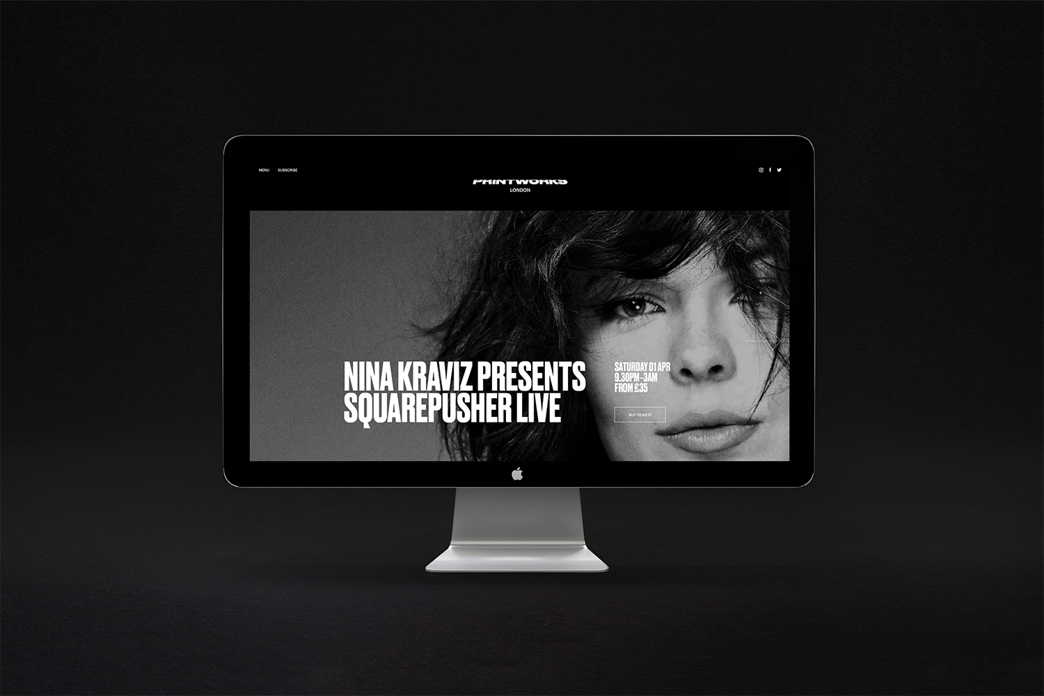 Desktop computer displaying the Printworks London website on a black background