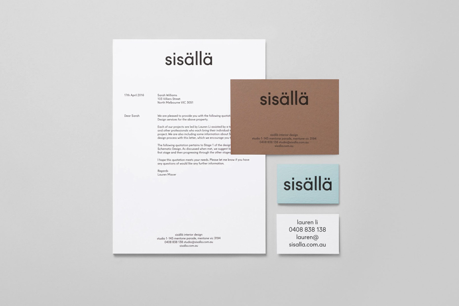 Flat lay brand identity stationery for Sisalla featuring a letterhead, business cards, and note cards on grey