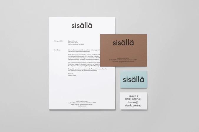 Flat lay brand identity stationery for Sisalla featuring a letterhead, business cards, and note cards on grey