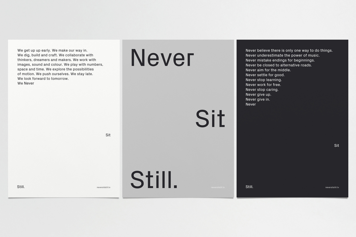 Three minimalist graphic design posters featuring bold typography with the phrase Never Sit Still across white, grey, and black panels.