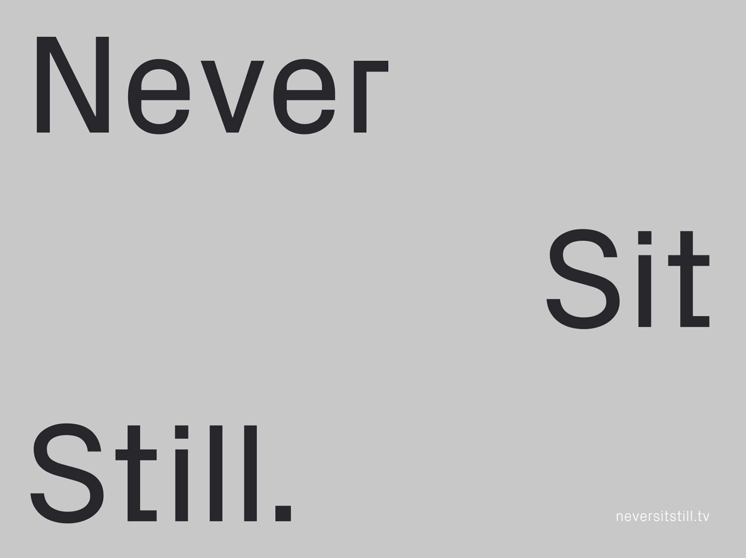 Typography graphic displaying black text reading Never Sit Still on a solid light grey background