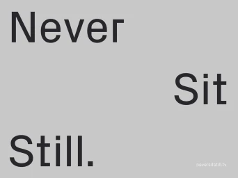Typography graphic displaying black text reading Never Sit Still on a solid light grey background