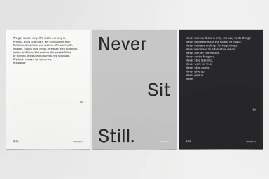 Three minimalist graphic design posters featuring bold typography with the phrase Never Sit Still across white, grey, and black panels.