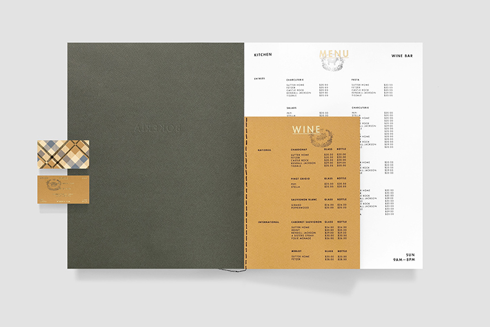 Branding materials for Bokeria featuring a menu booklet, small cards, and patterned business cards on a white background